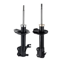 Shock Absorber set front axle gas KYB suitable for NISSAN...
