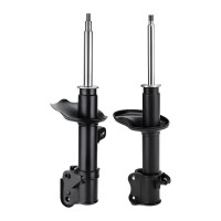 Shock Absorber set front axle gas KYB suitable for NISSAN...